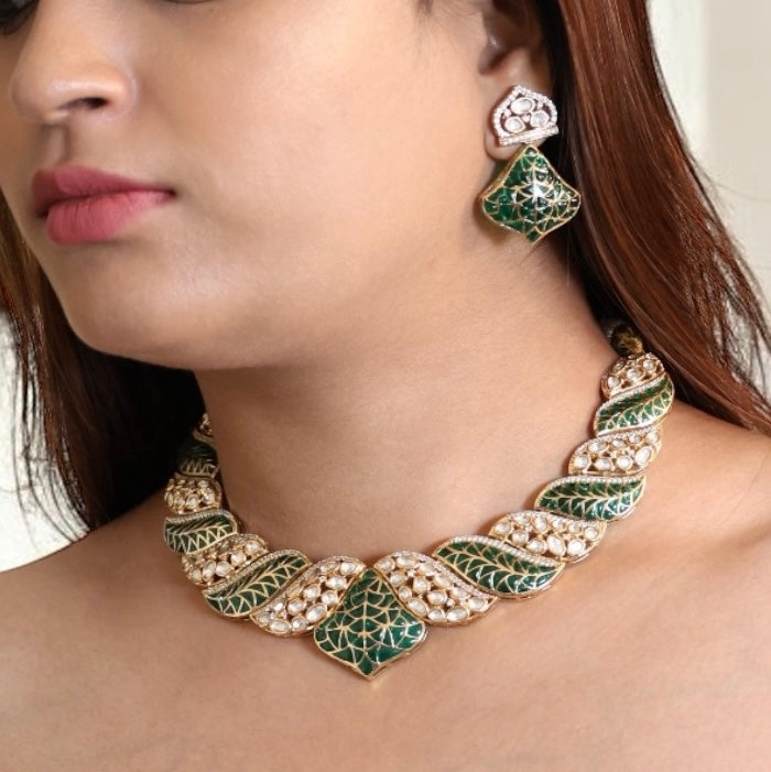 Emerald leaf kundan necklace with green enamel and matching earrings
